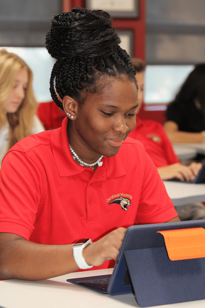 Female black student using ipad